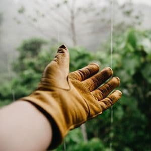 An IrriGators LLC team member at work on a customer's property