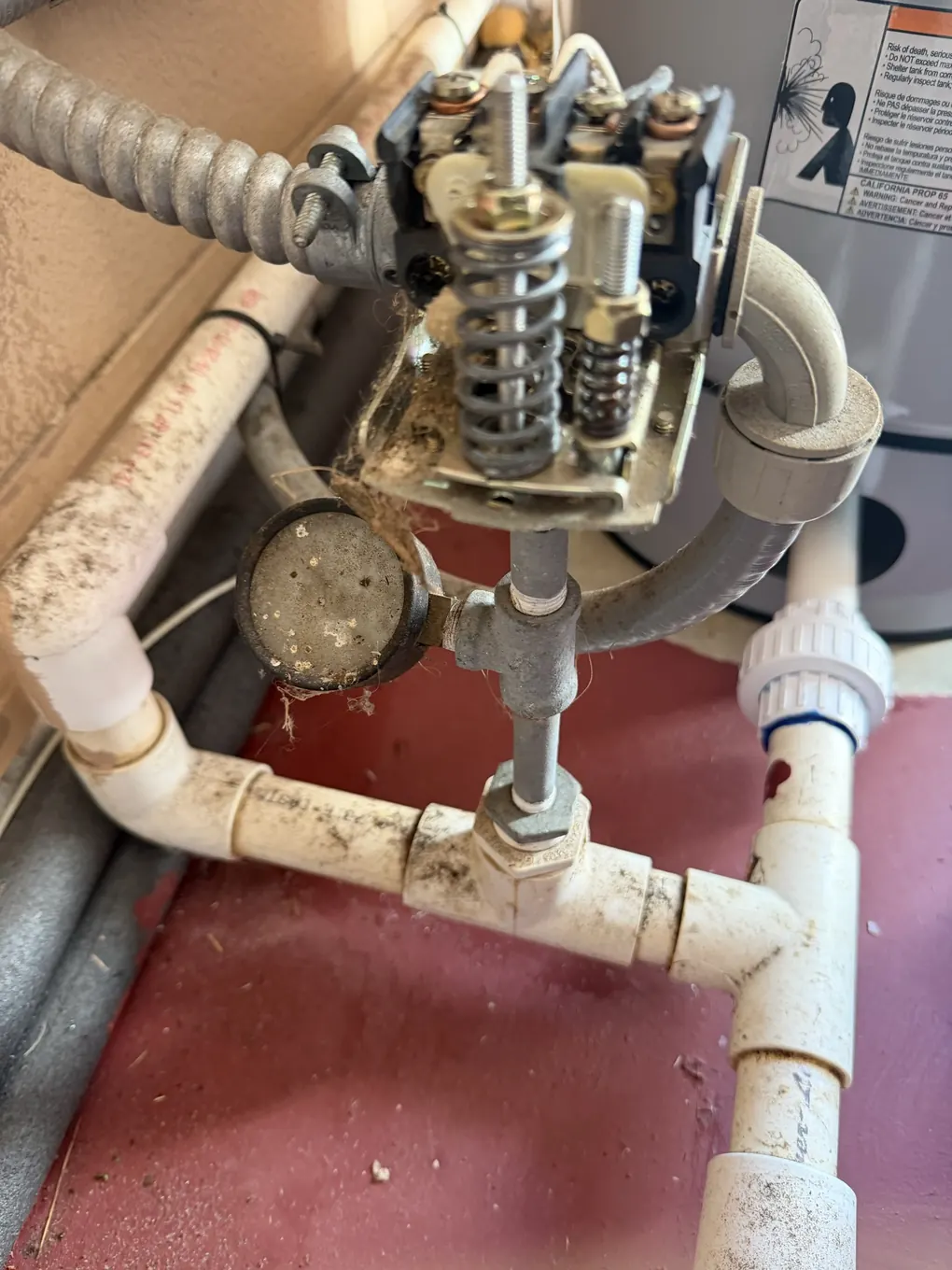 Corroded well pump pressure switch and failed gauge before replacement
