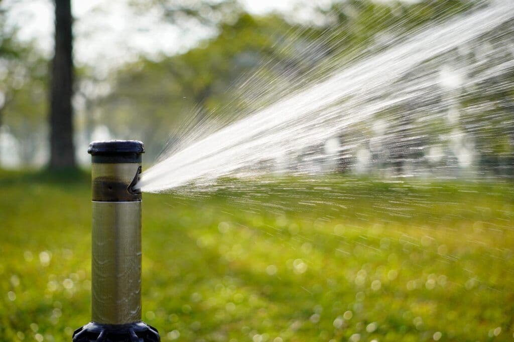 Rotor sprinkler head watering turf