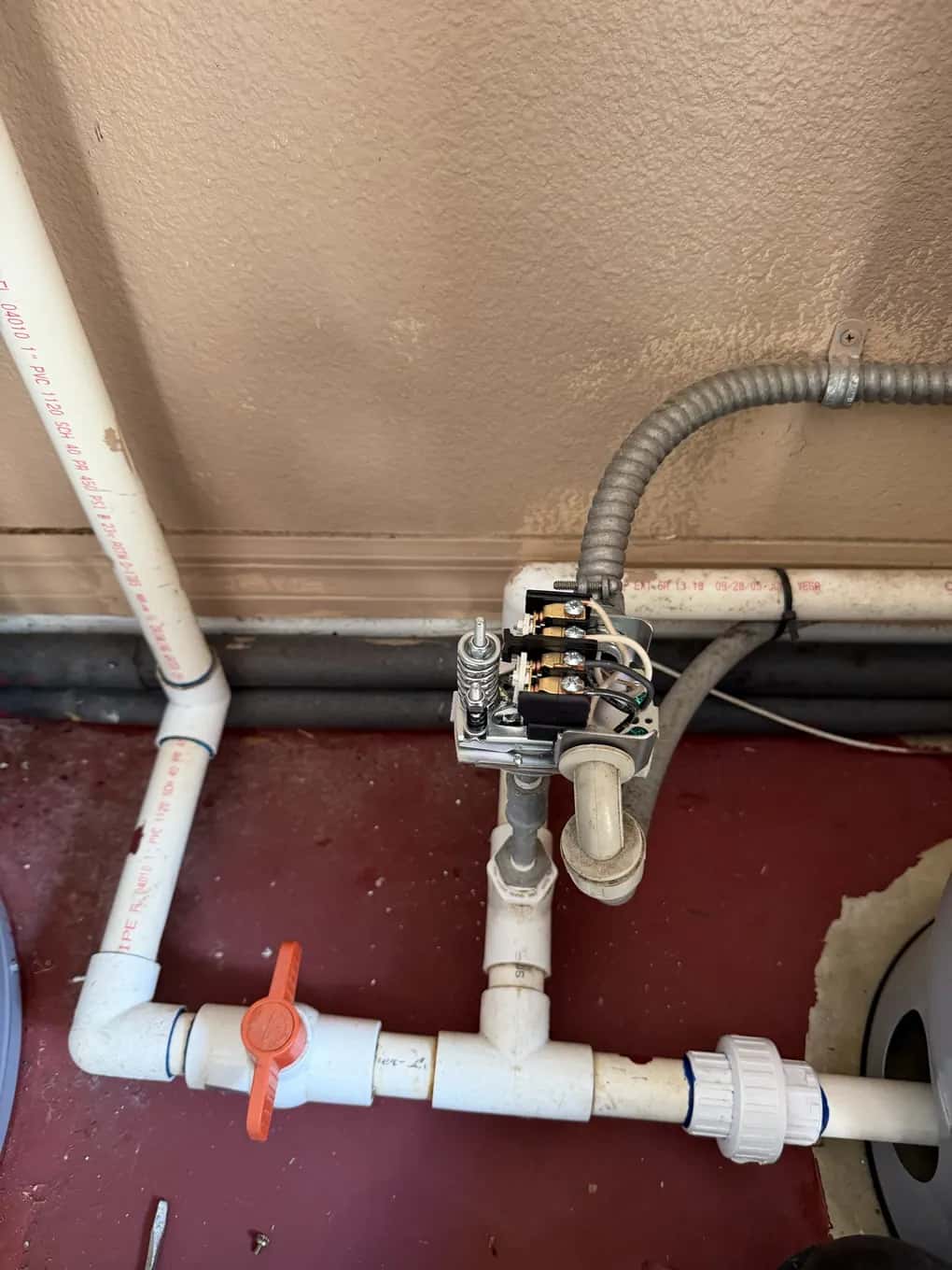Replacement well pressure switch on a new PVC tank tee with shut-off and union fittings