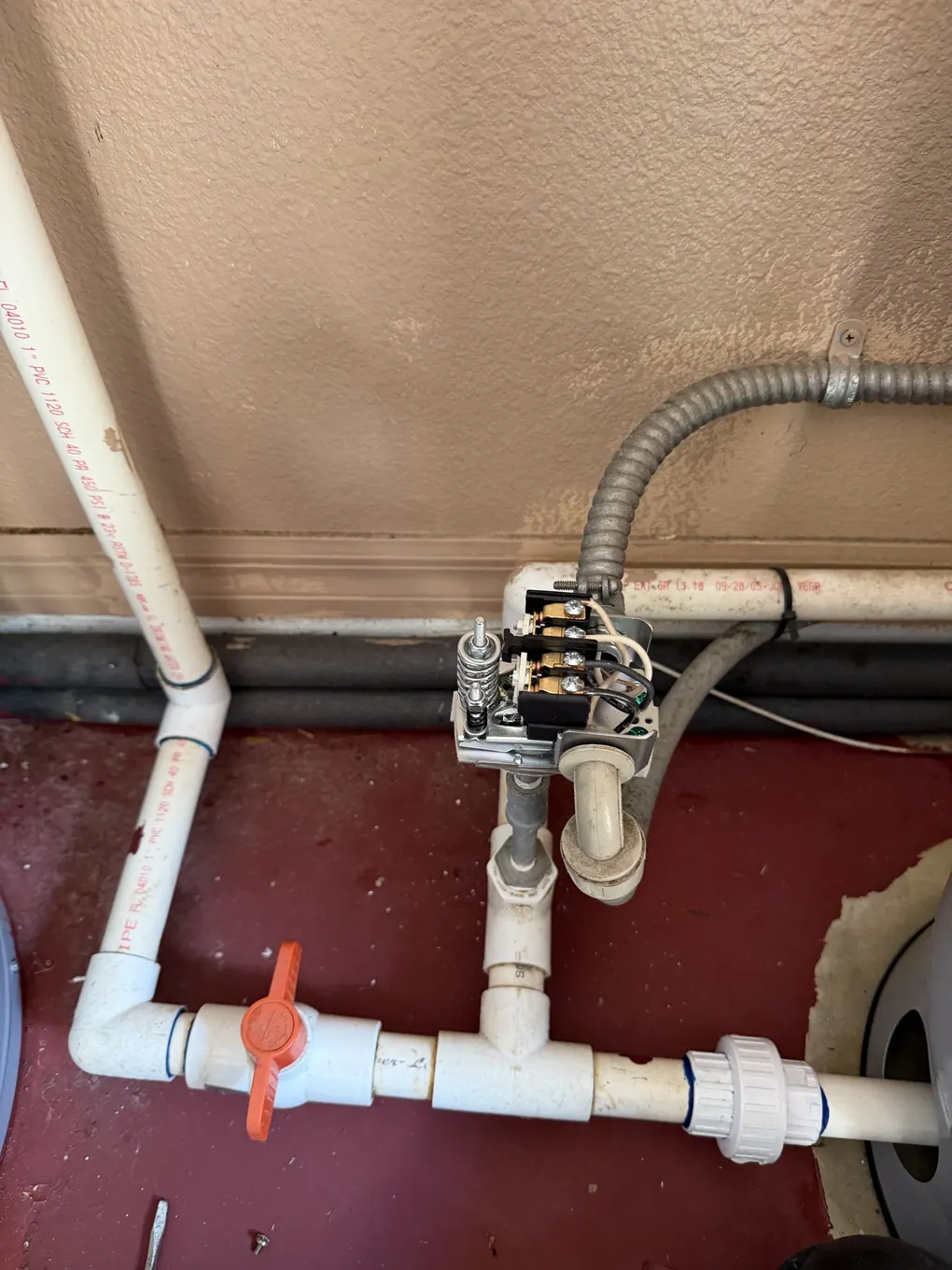 Replacement well pressure switch on a new PVC tank tee with shut-off and union fittings